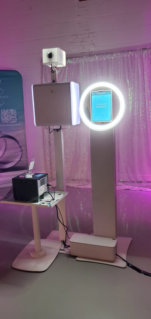 A close up shot of a sleek photo booth setup at a Toronto wedding open house event.